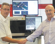 Harald Eppinger(left), joint managing director of Koh Young Europe, and Zalman Orlianski, managing director of Zetech, shake hands on their distribution agreement.